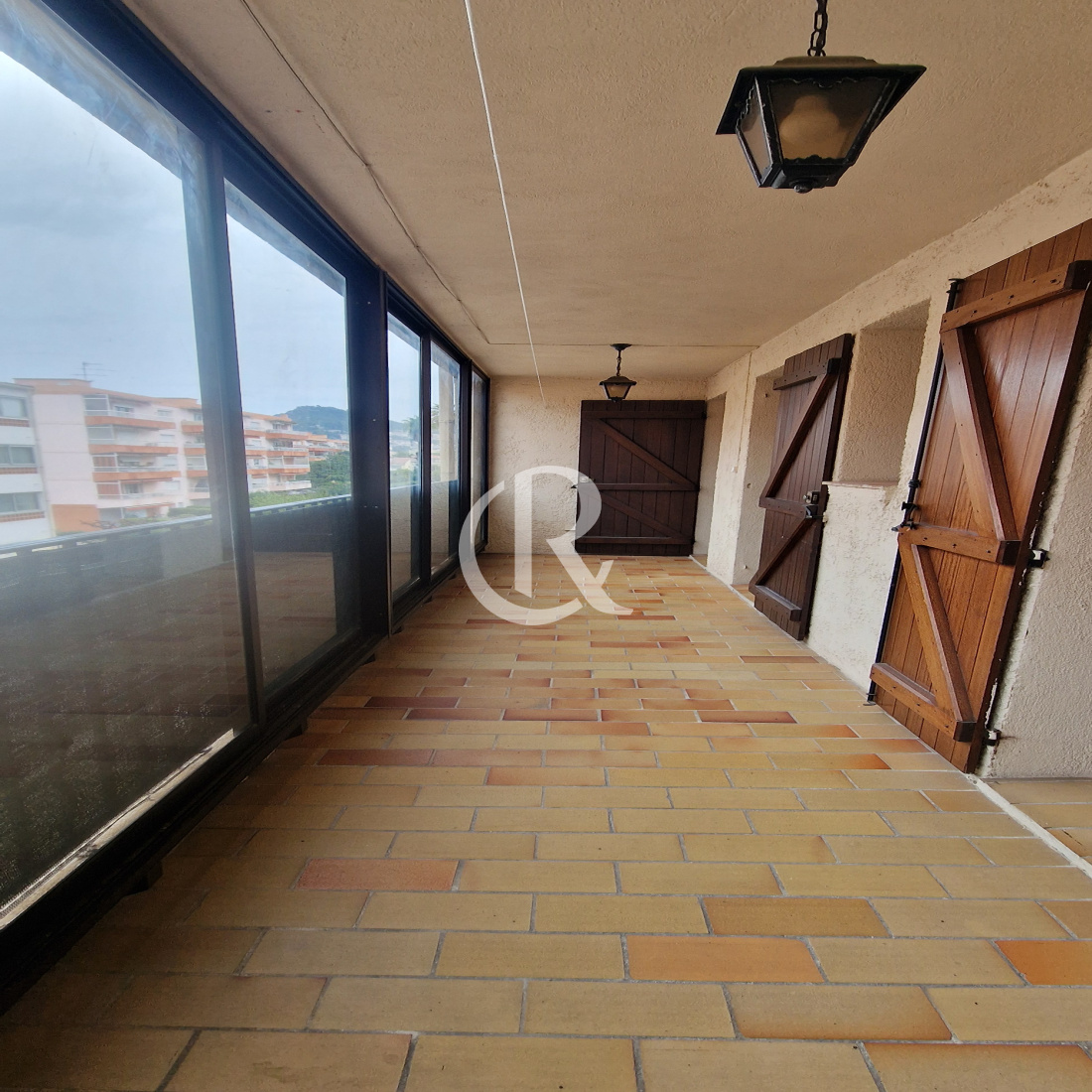 Balcon fermé par Véranda Ouest